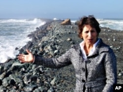 Wave Energy AS program director Stephanie Thornton hopes to harness the power of the crashing waves near Barview, Oregon.