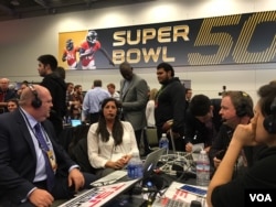 ESPN show hosts talk about the big game, on Radio Row for Super Bowl 50, at the Moscone Convention Center in San Francisco, Feb. 5, 2016. (P. Brewer/VOA)