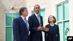 President Barack Obama with Oregon Gov. Kate Brown and Roseburg Mayor Larry following their meeting with families of the victims of the Oct. 1, shooting at Umpqua Community College, Oct. 9, 2015 in Roseburg, Oregon.