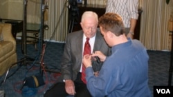 Preparing President Carter for an interview in 2006 in Chicago during the book tour for "Palestine: Peace Not Apartheid."