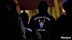 Members of a vigilante group calling themselves 'Soldiers of Odin' are seen at a rally in Joensuu, eastern Finland, January 8, 2016.