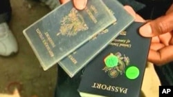 Haitians present US passports in hopes of getting on a military flight to the United States