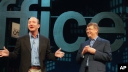 How do some people become so successful? Here are two examples of financial success. On the left is Jeff Bezos, founder and CEO of Amazon.com, and on the right is Bill Gates, Microsoft Corp. chairman and chief software architect. (2001 AP Photo)