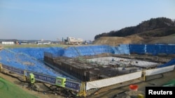FILE - The construction site of Gangneung Ice Arena which will be a venue for the figure skating and short track competitions during the 2018 Winter Olympic Games, in the coastal cluster of PyeongChang, February 11, 2015.