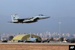 FILE - A U. S. Air Force F15 fighter jet takes off from Incirlik Air Base in Turkey, Dec. 15, 2015.