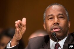 FILE - Housing and Urban Development Secretary-designate Ben Carson testifies at his confirmation hearing before the Senate Banking, Housing, and Urban Affairs Committee on Capitol Hill in Washington, Jan. 12, 2017.