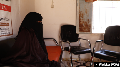 Fatima, who was gang-raped by three strangers outside her family's home in a camp for displaced people in Puntland, waits at a women's health clinic in Garowe.