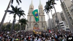 Protesters gather in front of the Metropolitan Cathedral in Sao Paulo, Brazil, June 18, 2013