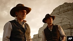 Cowboys vs. Aliens. Harrison Ford, Daniel Craig, Movie release July 29 2011.