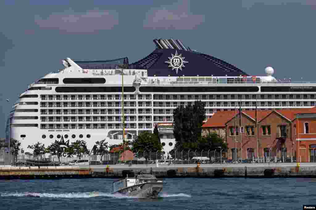 Cruise ship MSC Orchestra arrives in Venice despite protests demanding an end to cruise ships passing through the lagoon city in Venice, Italy.