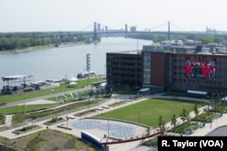 The revitalization of downtown Toledo, Ohio, is illustrated by its recently renovated Promenade Park, an outdoor community event and concert space along the Maumee River.