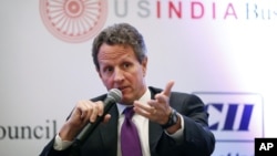 U.S. Treasury Secretary Timothy Geithner interacts with invitees of the Indian trade body, Confederation of Indian Industries, in New Delhi, India, October 9, 2012.