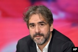 FILE - In this July 21, 2016, photo German-Turkish journalist Deniz Yucel ia pictured during a talkshow in Berlin, Germany.