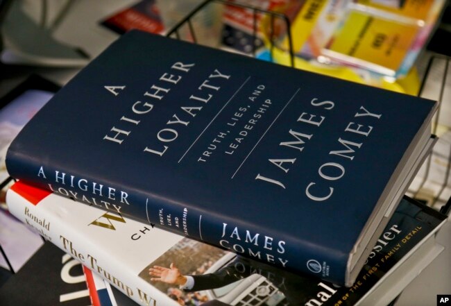 A copy of former FBI Director James Comey's new book, "A Higher Loyalty: Truth, Lies and Leadership," is on display, Apr. 13, 2018, in New York.