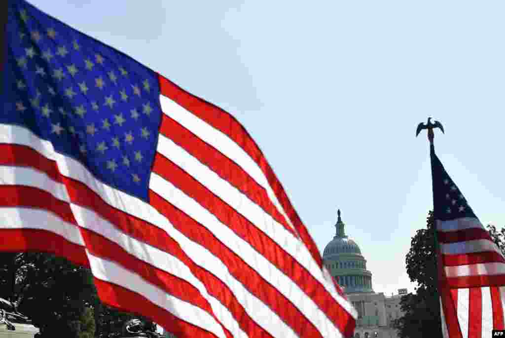 US flags are seen near the Mall in front of the US Capitol in Washington, DC 