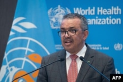 FILE - WHO Director-General Tedros Adhanom Ghebreyesus speaks in Geneva, in this handout picture made available by the WHO on Nov. 29, 2021.