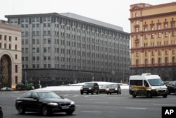 FILE - FSB headquarters, the grey building at center, in downtown Moscow, Dec. 30, 2016.