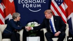 President Donald Trump meets with British Prime Minister Theresa May at the World Economic Forum, Jan. 25, 2018, in Davos, Switzerland.