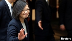 FILE - Taiwan President Tsai Ing-wen leaves a luncheon during a stop-over after her visit to Latin America in Burlingame, California, U.S.