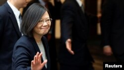 FILE - Taiwan President Tsai Ing-wen leaves a luncheon during a stop-over after her visit to Latin America in Burlingame, California.