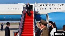 U.S. Secretary of State Mike Pompeo exits his plane on arrival in Pyongyang, North Korea, May 9, 2018.