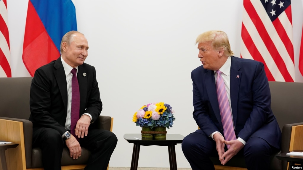Tổng thống Nga và Mỹ trong cuộc gặp hồi tháng Sáu năm nay.
