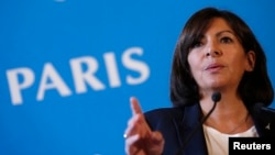 FILE - Mayor Anne Hidalgo says "the image of Paris has been prejudiced" by Fox News. 