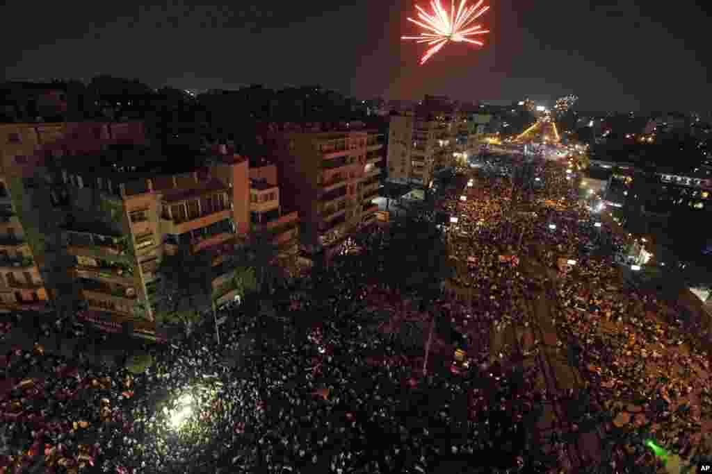 Fireworks light the sky moments after Egypt's military chief says the president is replaced by chief justice of constitutional court outside the presidential palace in Cairo, July 3, 2013. 