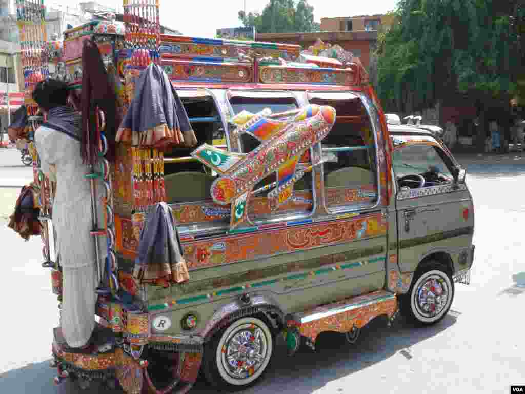 A heavily-decorated bus in Islamabad, Pakistan, July 10, 2012. (S. Gul/VOA)