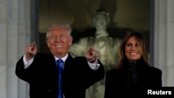 U.S. President-elect Donald Trump and his wife Melania take part in a Make America Great Again welcome concert in Washington, Jan. 19, 2017.