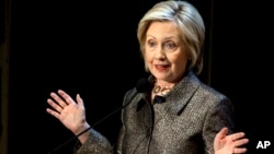 Democratic presidential candidate Hillary Clinton speaks before presenting The Hillary Rodham Clinton Awards for Advancing Women in Peace and Security, in the Riggs Library at Georgetown University in Washington, D.C., April 22, 2015. 
