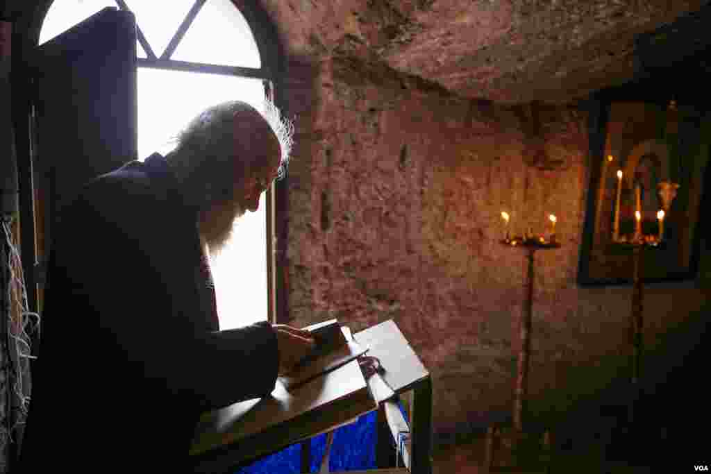 At Old Orhei, 60 kilometers from Chisinau, an Orthodox priest takes care of ancient church and monastery carved out of limestone cliffs almost 1,000 years ago. (Vera Undritz for VOA)