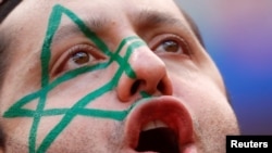 Un supporter marocain dans le stade avant le match de la coupe du monde contre l’Iran, au stade Luzhniki, Moscou, Russie, 20 juin 2018. 