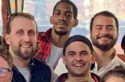 Francis Wilson, right, and Zack Armstrong, left, their third roommate Bruce Barlow, (center) and friend Jourdan in healthier times.