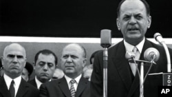 FILE - In this 1967 file photo, Greek dictator George Papadopoulos, right, Stylianos Pattakos, far left, and Nikolaos Makarezos, center, are seen in Athens. Stylianos Pattakos, the last survivor among the leaders of a 1967 coup that ruled Greece for seven years, has died at 103.