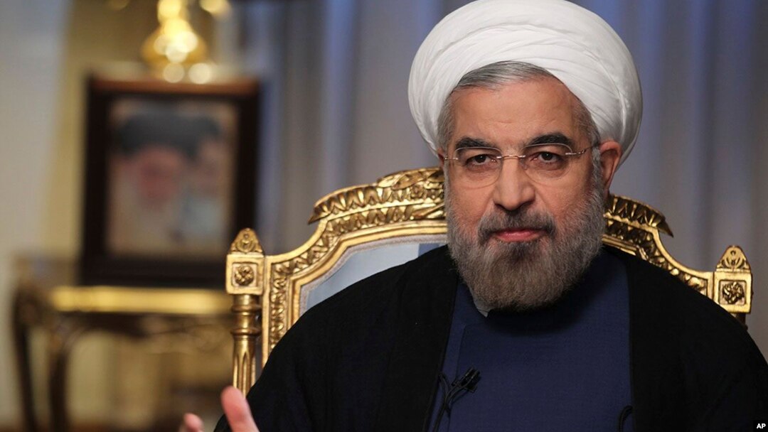  Iranian President Hassan Rouhani speaks during an interview with state television at the presidency in Tehran, Sept. 10, 2013.