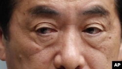 Japan's Prime Minister Naoto Kan attends a news conference in Tokyo, April 12, 2011