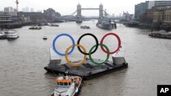 Backdropped by the historic Tower Bridge, a giant Olympic Rings floats on the River Thames in London in the run-up for the Olympic games.