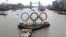 Backdropped by the historic Tower Bridge, a giant Olympic Rings floats on the River Thames in London in the run-up for the Olympic games, during its launch to mark 150-days until the start of the London 2012 Olympic games, February 28, 2012. 
