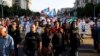 FILE - Supporters of Malaysian opposition leader Anwar Ibrahim march toward the Palace of Justice at Putrajaya, Malaysia, Feb. 10, 2015.