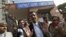Manohar Lal Sharma (C), lawyer of one of the accused, speaks with the media outside a district court in New Delhi, January 10, 2013. 
