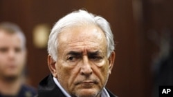 International Monetary Fund (IMF) chief Dominique Strauss-Kahn appears in Manhattan Criminal Court during his arraignment in New York May 16, 2011