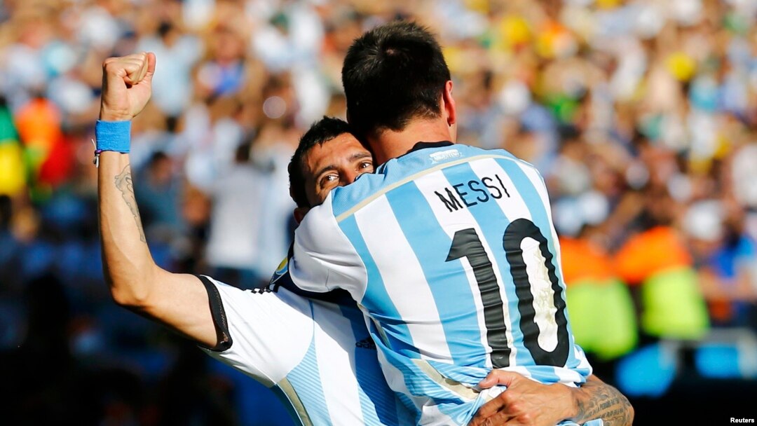 Argentina's Angel Di Maria celebrates after scoring a goal with teammate Lionel Messi during extra time in their 2014 World Cup round of 16 game against Switzerland at the Corinthians arena in Sao Paulo, July 1, 2014.