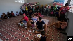 People displaced by violence in the Catatumbo region, where rebels of the National Liberation Army have been clashing with former members of the Revolutionary Armed Forces of Colombia, take shelter at a school in Tibu, Colombia, Jan. 20, 2025. 