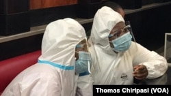 Joana Mamombe naCecilia Chimbiri In Hasmat Suit 