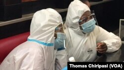Joana Mamombe naCecilia Chimbiri In Hasmat Suit 