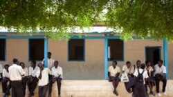 FILE- Secondary school Sudanese students during a break at Supiri Secondary School in Juba, South Sudan. The school is mixed boys and girls. (UNESCO/B. Desrus).