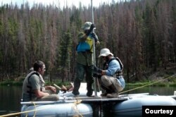 University of Montana professor Philip Higuera, right, and his team collect lake sediment from Chickaree Lake in Rocky Mountain National Park, used to reconstruct fire and vegetation history. (Grace Carter photo; image courtesy of Philip Higuera)