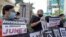 Various of groups of pro-democracy activists, including Lee Cheuk-Yan, center, arrive at a court in Hong Kong, Thursday, Oct. 15, 2020. Prominent activists Jimmy Lai and Joshua Wong were among more than two dozen activists appearing in court after…