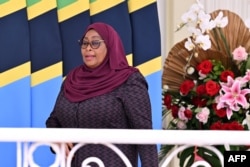 FILE - Tanzania's President Samia Suluhu Hassan walks during a visit at the Bogor palace in Bogor, West Java on January 25, 2024.